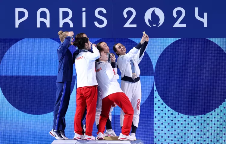 A group of people on a podiumDescription automatically generated