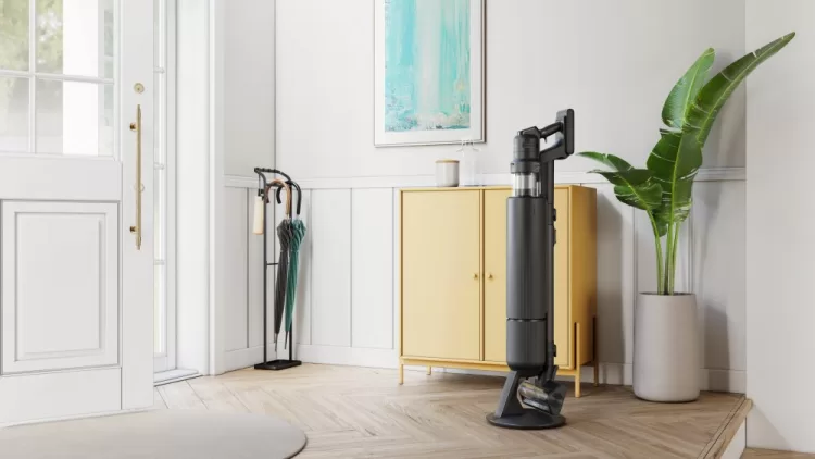 A room with a yellow cabinet and a black vacuum cleaner AI-generated content may be incorrect.