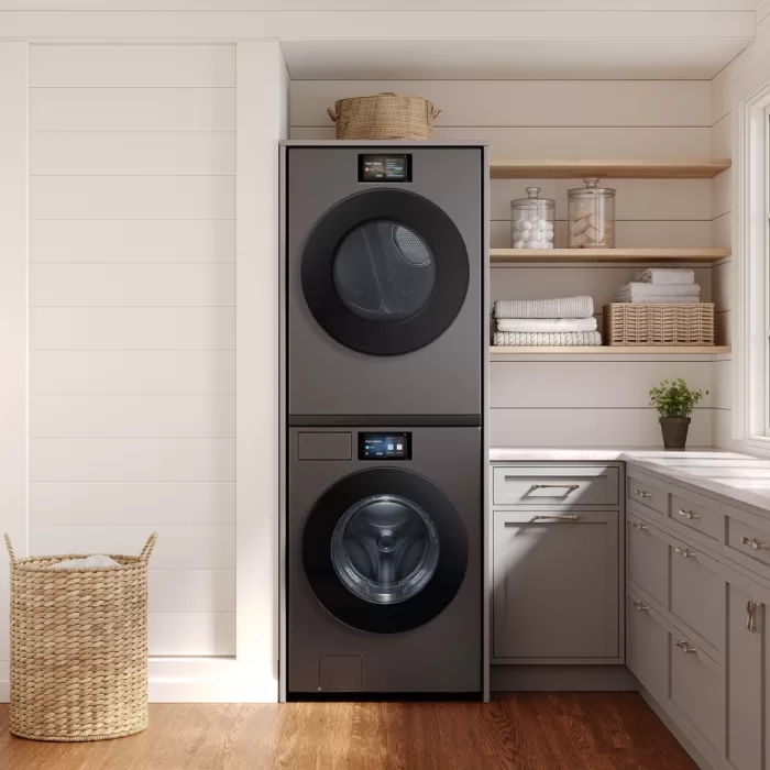 A washing machine in a laundry room AI-generated content may be incorrect.